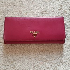 Prada saffiano wallet gold logo